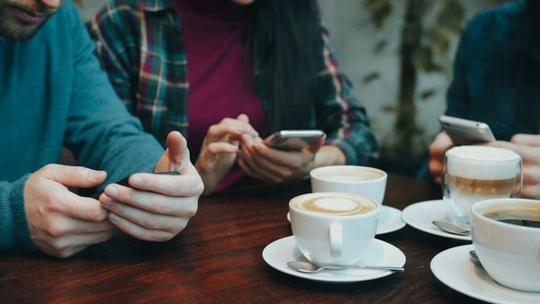 Smartphone showing Google AI Overviews in Singapore search results